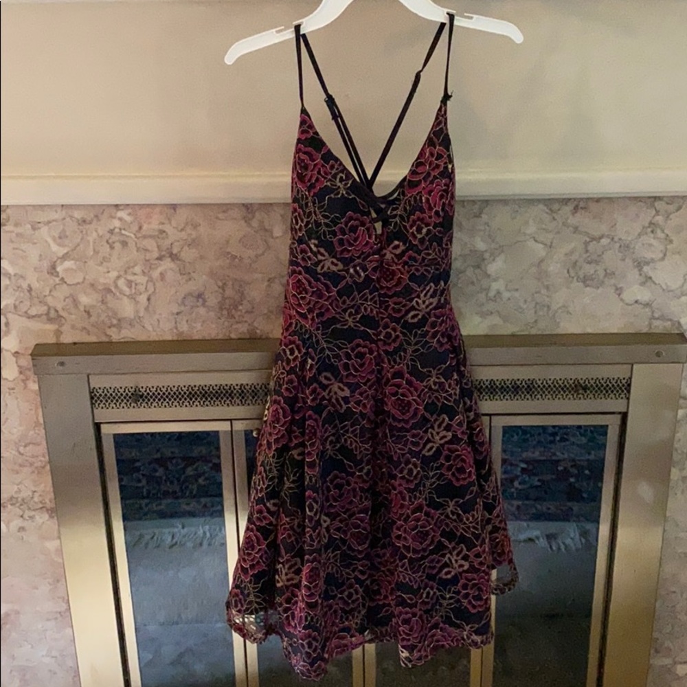 Red, gold and black jump apparel dress